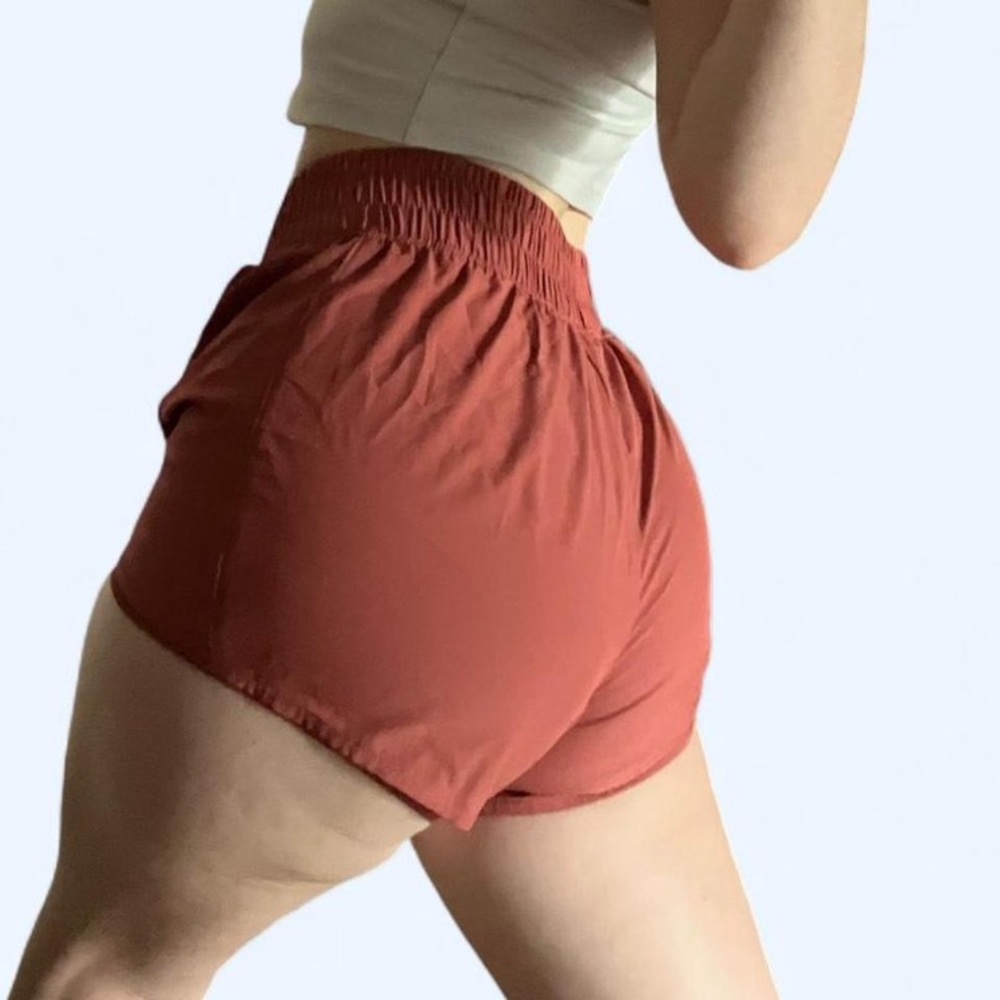 NWOT Burnt Orange Running Booty Shorts